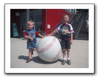 After the Game the Kids Find a Huge Baseball